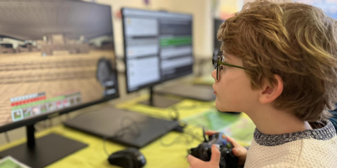 Child playing Minecraft