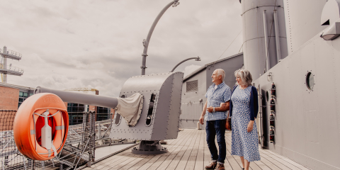 Couple on top deck of HMS Caroline